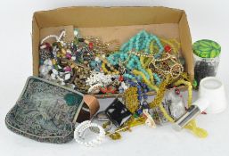 An assortment of vintage costume jewelley