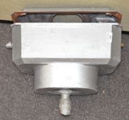 A silver painted cast iron toilet cistern,
