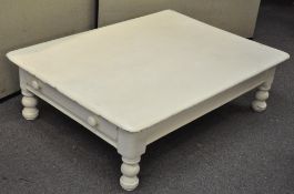 A white painted coffee table,
