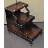 A set of Victorian style mahogany bed steps, three steps, the top with galleried border,