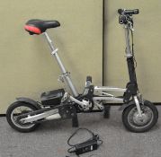 A battery powered "compact" fold up push bike with charger