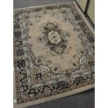 A vintage rug, label to base reads "Lancaster, Beige,