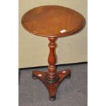 A late 19th century mahogany wine table of circular form,