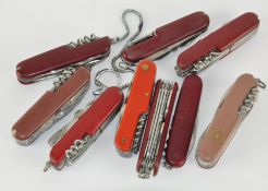 Ten Swiss Army knives