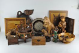 An assortment of wooden items, to include a novelty puzzle money box,