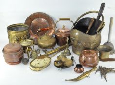 A collection of brass and other metalware,