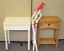 A group of furniture, comprising a white painted children's desk,