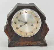 A Deco oak cased clock