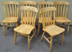 A set of six dining chairs,