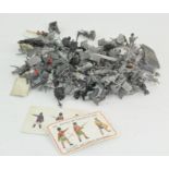 A collection of metal toy soldiers, including Battle of Waterloo soldiers,