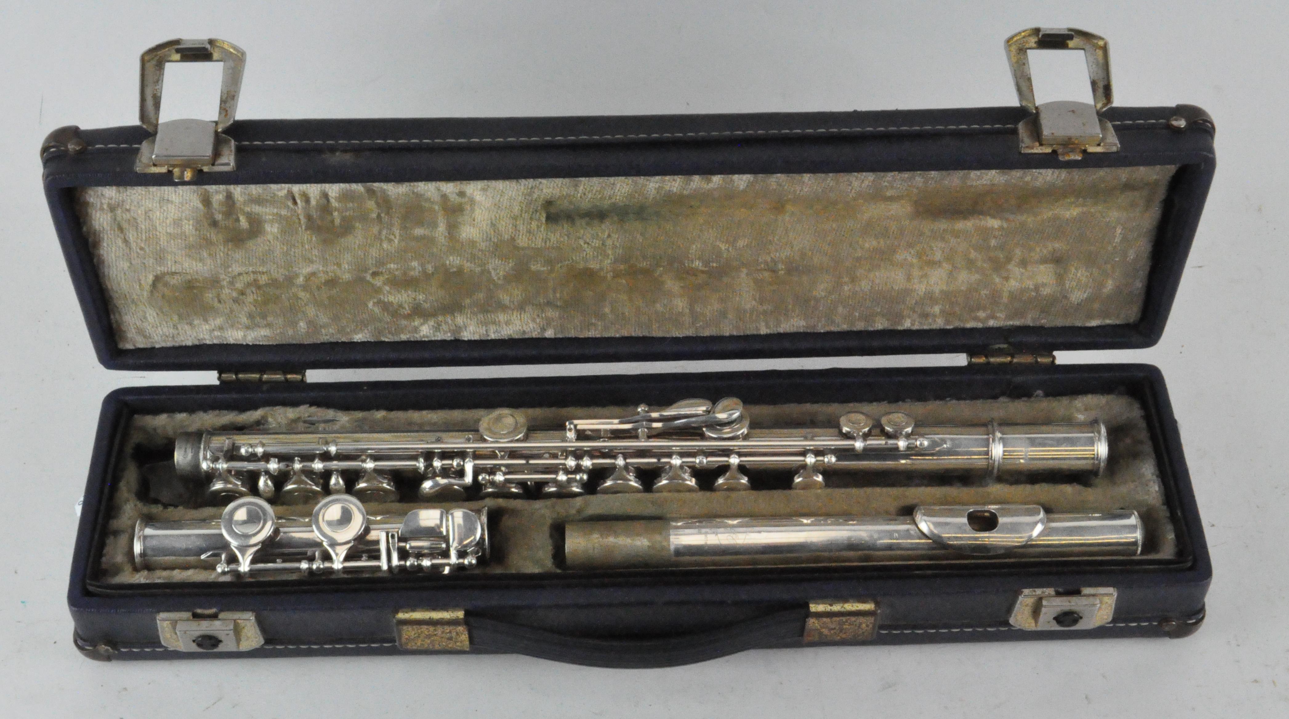 A Boosey and Hawkes 'Empower' silver plated flute,