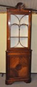A Georgian style mahogany glazed corner cabinet,