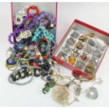 Two boxes of assorted costume jewellery,