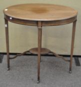A late 19th/early 20th century mahogany occasional table of oval form,