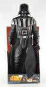 A giant size Darth Vader figure,