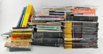 Two boxes containing a large selection of books and magazines