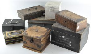 A large collection of money boxes and tins,