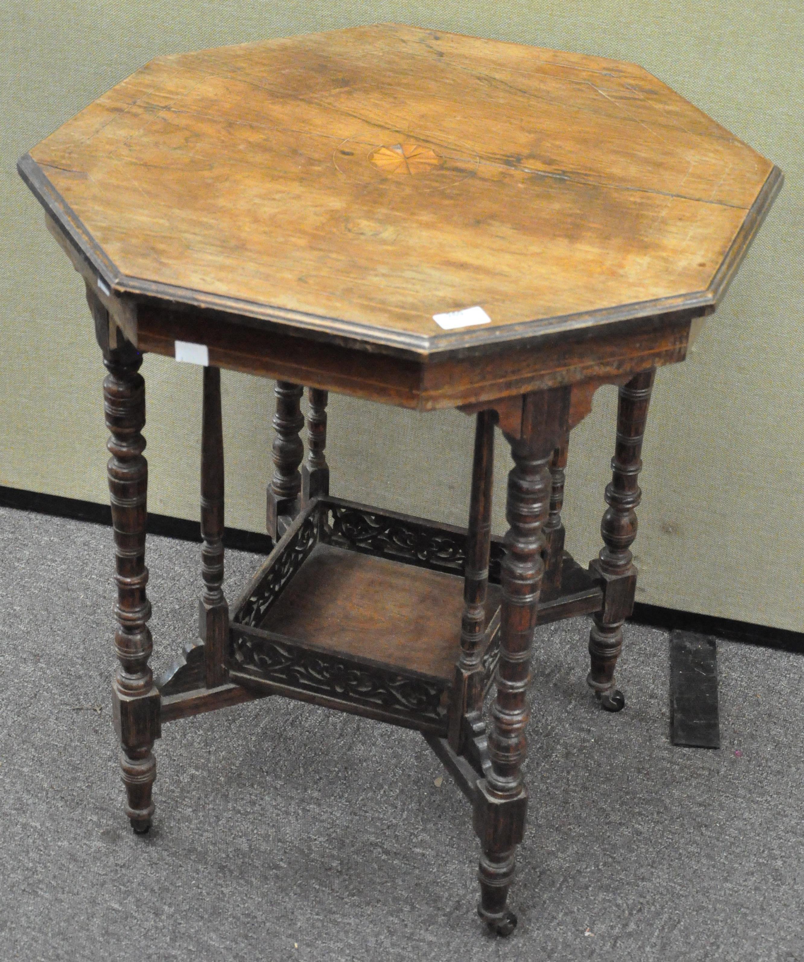 A late 19th century side table of octagonal form with inlaid decoration to the top,