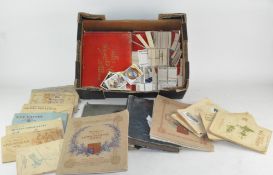 A collection of cigarette cards and albums