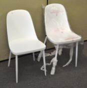 A pair of modern white 'Helev' dining chairs,