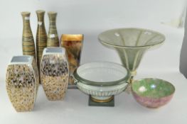 A collection of assorted items, mostly ceramics, including vases,