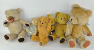 A collection of assorted vintage teddy bears