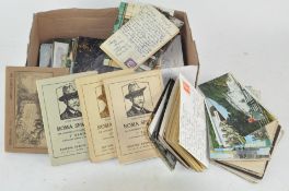 A collection of vintage postcards and birthday cards