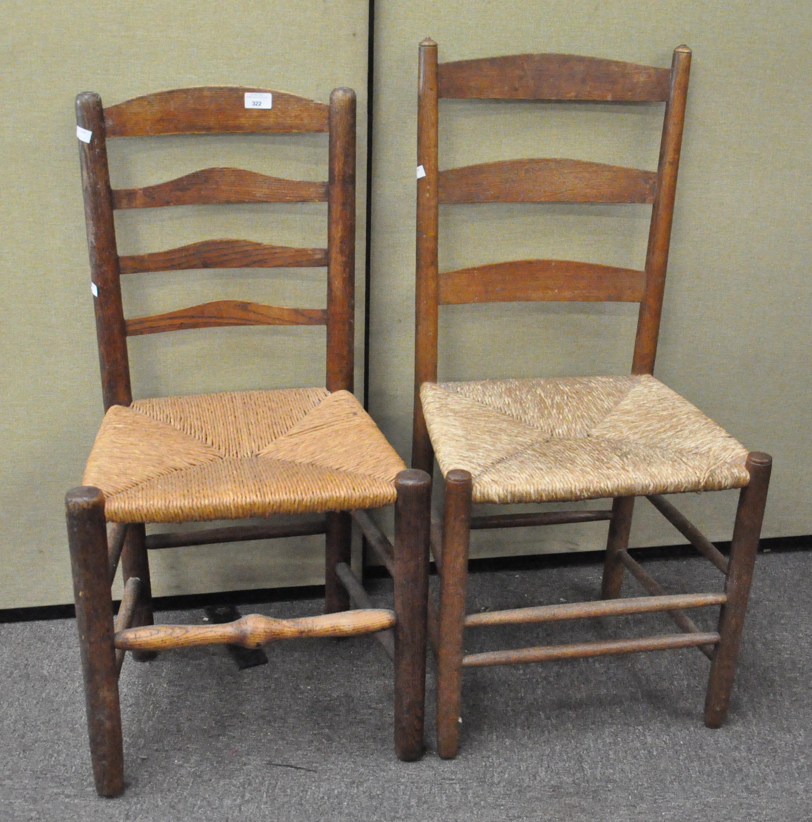 A set of two early 20th century rattan seated ladderback chairs,
