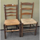 A set of two early 20th century rattan seated ladderback chairs,