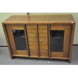 A 20th century Wills and Gambia oak sideboard,