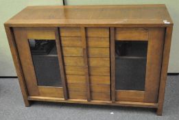 A 20th century Wills and Gambia oak sideboard,