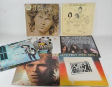 A collection of assorted vinyl records,