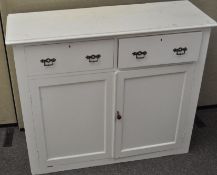 A white painted Edwardian dresser cupboard,
