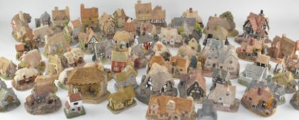 A large collection of Lilliput Lane and similar houses, spread over two boxes,