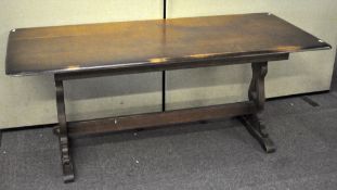 A vintage dining/kitchen table of rectangular form,