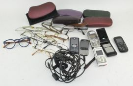 Six vintage mobile phones, Nokia, Motorola, Samsung,