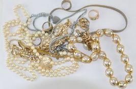 A box of vintage fashion jewellery, including necklace, pearls,
