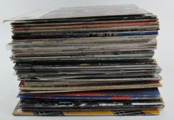 A collection of various vinyl records and albums, mostly of classical interest,