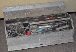 A heavy tool box with contents, of which includes drill bits,
