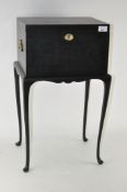 A black painted savings box,