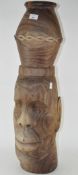 A large African tribal carved head,