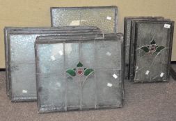 Ten panels of leaded early 20th century stained glass