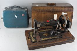 A Harris cased sewing machine,