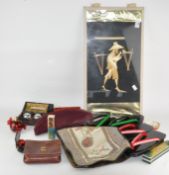 An assortment of Oriental items, including a Harmonica,