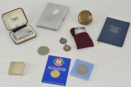 Assorted items, including two silver medallions, tow Ronson lighters,