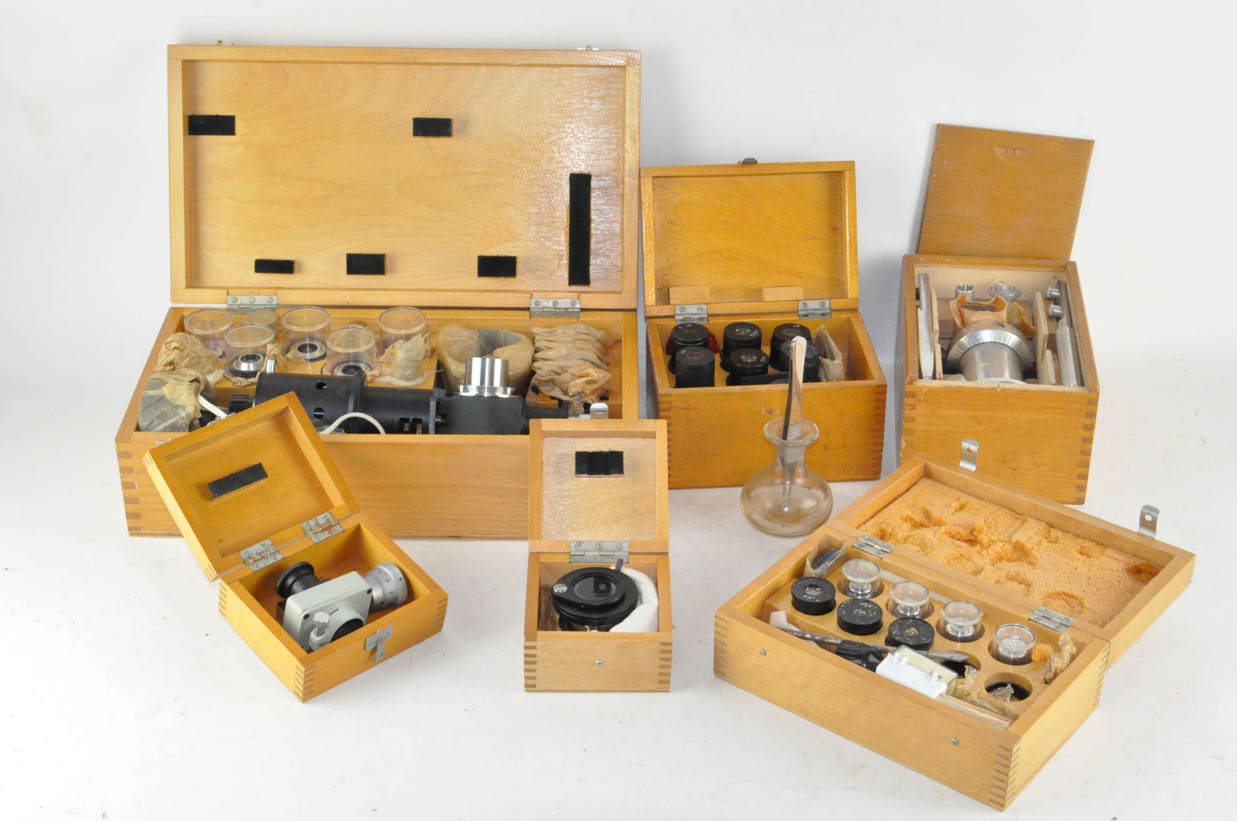 A cased OMO (USSR) microscope and cased lenses