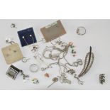 A box of silver jewellery, including earrings, necklace,