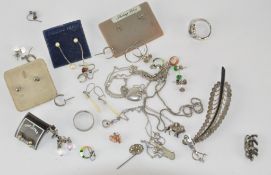 A box of silver jewellery, including earrings, necklace,