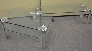 A glass metal mounted coffee table of rectangular form;