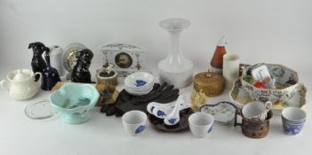 Assorted collectables, to include two ceramic clocks, a Russian doll,